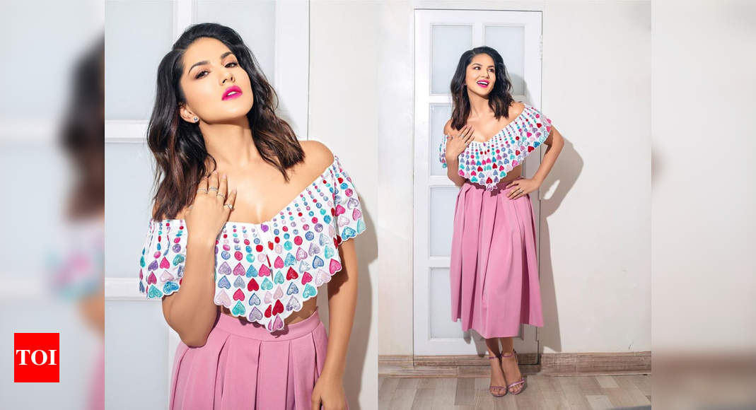 Sunny Leone's heart-filled crop top and pink skirt combo is the quirkiest  outfit for the New Year's Eve party - Times of India