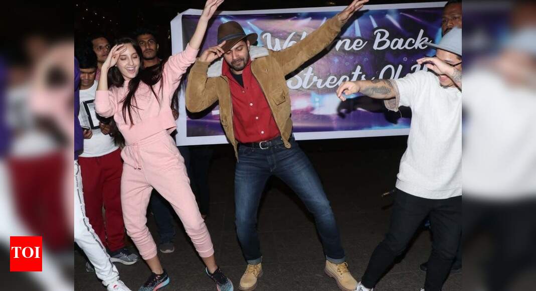 After arriving from his romantic vacay, Varun Dhawan grooves with his