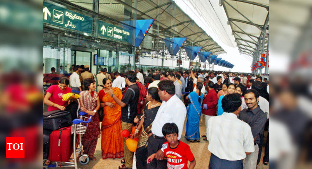 Passengers Rajiv Gandhi International Airport set cross