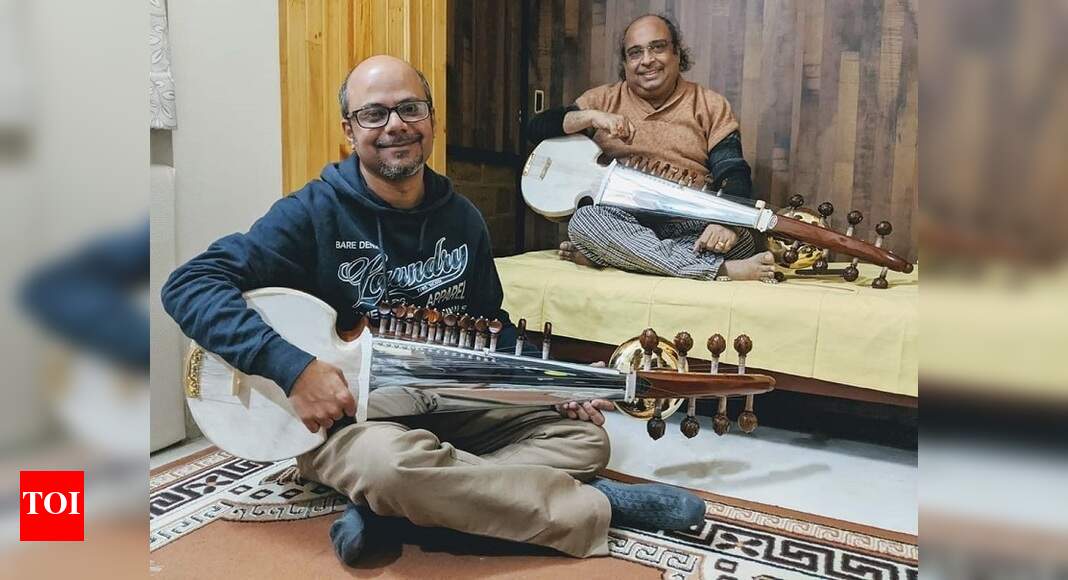 Srijato taking sarod classes from Tejendra Narayan Majumdar Bengali