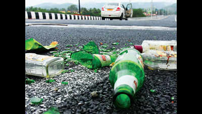 Glass trash poses hazard for walkers