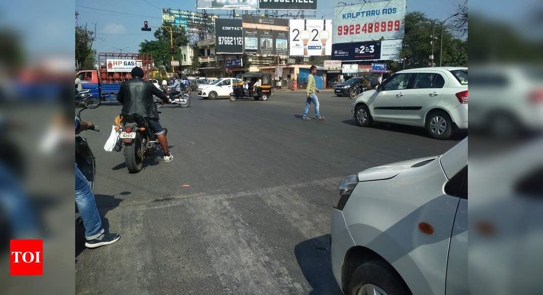 Zebra crossing violation in front on traffic polic - Times of India