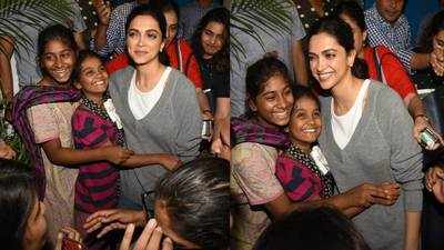 Deepika Padukone's adorable group hug with two little fans is everything pure!
