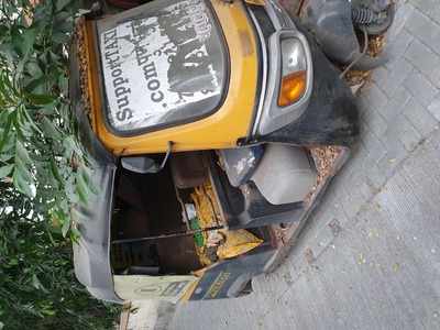 Old rickshaw becoming dust bin