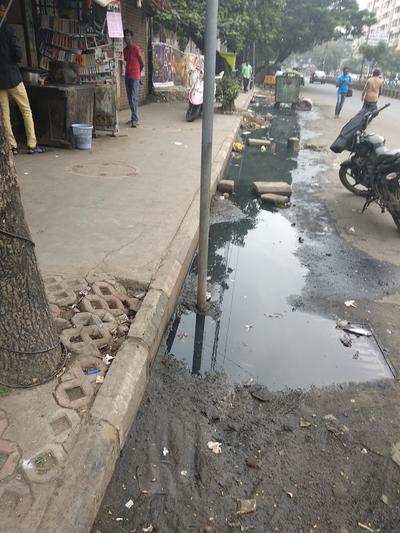 Sewage on the busy Main Road