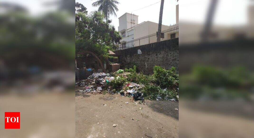 Garbage dumped on a busy Pycrofts Garden Road Times of India