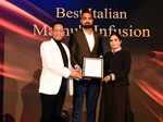 Best Italian (Casual Dining) Aniket Choudhary presents the award to Ashwani Joshi and Rinku Joshi of Mamu’s Infusion