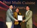 Best Multi Cuisine Digvijay Dhabhariya gives away the award to Chef Mihir and Rajeev Sharma of Monarch