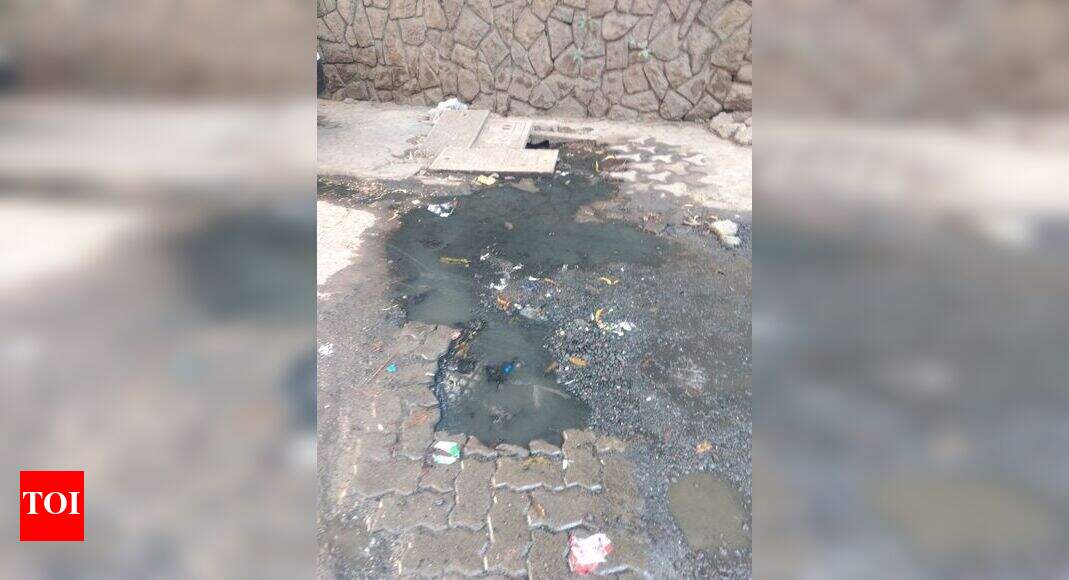 Broken/ Over flowing Gutter spewing waste Times of India