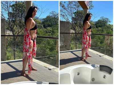 Monalisa flaunts her envious figure in a black bikini