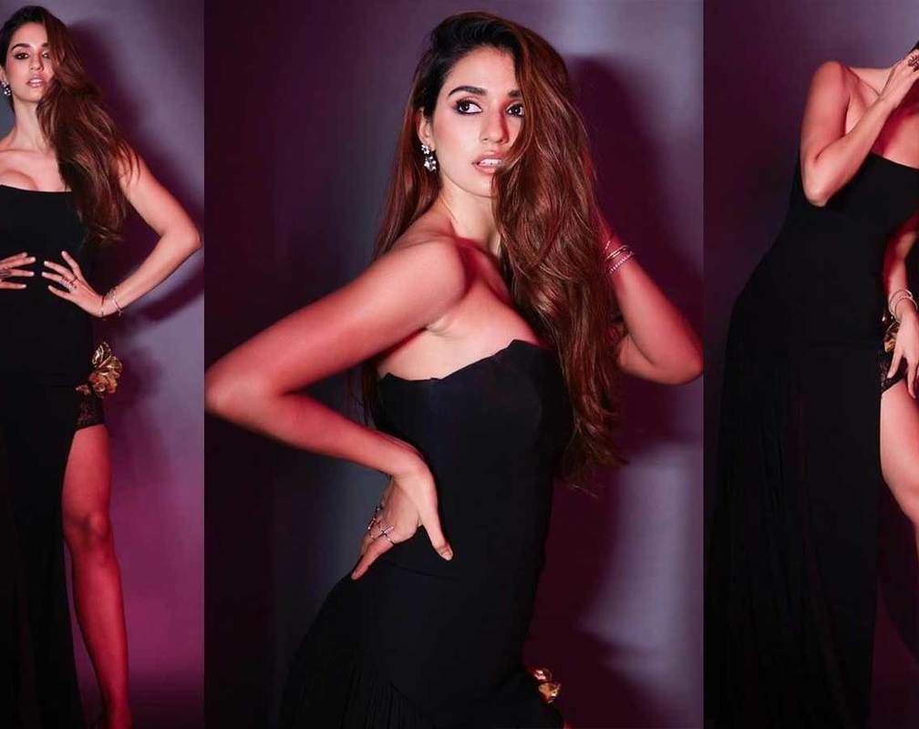 
Disha Patani looks breathtaking in this black off shoulder dress!

