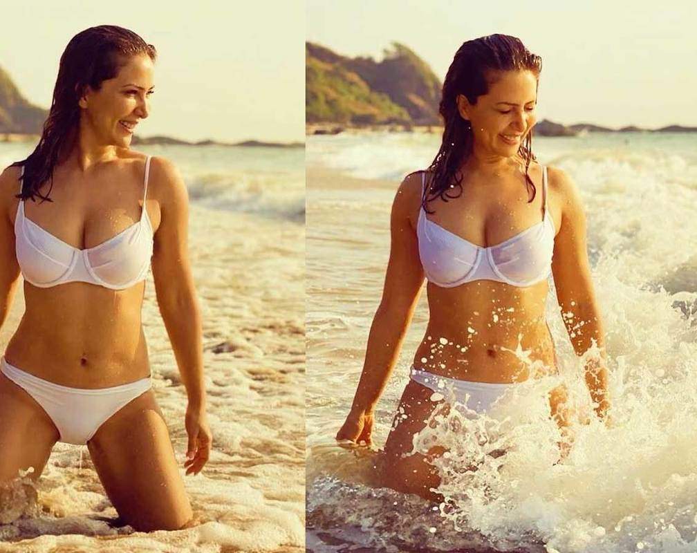 
These pictures of Kim Sharma in white bikini prove that she is a water baby!
