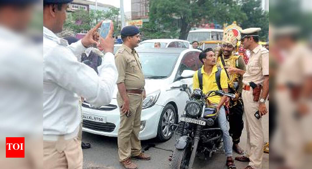 Gujarat government ‘wears’ helmet in high court, takes it off in public ...