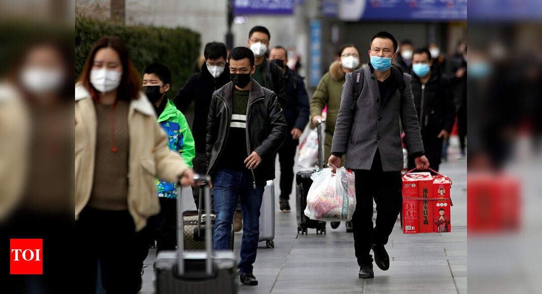 Desperate to stop coronavirus, China turns neighbour against neighbour