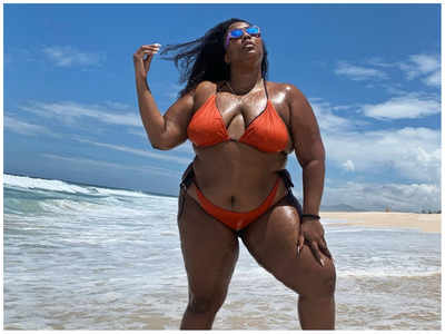 Lizzo channels 'Roll model' avatar in red bikini during Brazilian vacation
