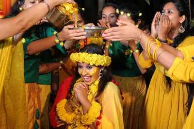 Happy-to-be Bride Sowbhagya Venkitesh shines in yellow at her haldi ceremony with fiance Arjun