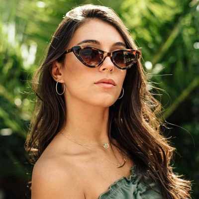 3 non-boring ways to style your cat-eye sunglasses this summer