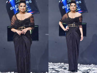Priyanka Chopra walked the ramp on her short trip to Mumbai and we can't get over her black gown look
