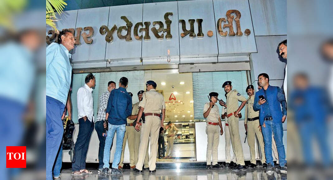Surat: Five rounds fired at a jeweller | Surat News - Times of India