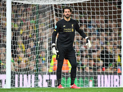 Liverpool’s Brazilian goalkeeper Alisson sees no reason to step off the accelerator