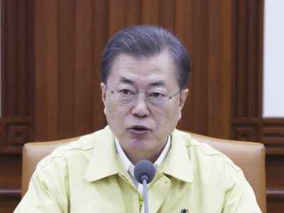 South Korea 'very grave', Moon says as coronavirus cases approach 900
