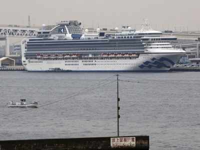 Dozens allowed off Japan virus-hit ship have 'symptoms': minister