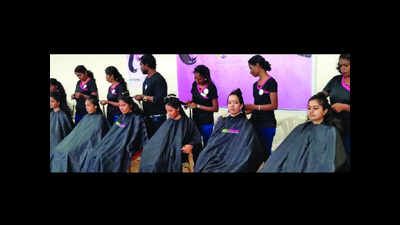 Locks of hope: MBA students donate hair for cancer patients
