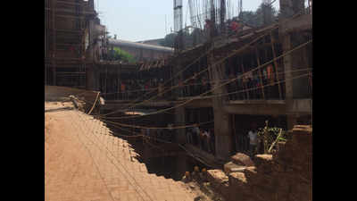 Two buried alive, one injured as retaining wall collapses at under construction hotel in Karnataka