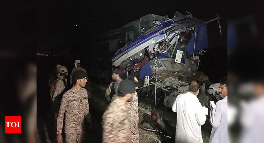 Karachi Bus Accident At Least 20 Killed As Train Collides With Bus At