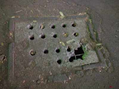 Broken manhole cover at busy Shivarka road Wanwadi