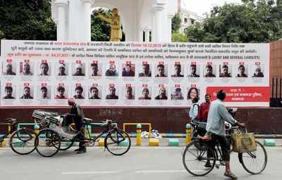 UP takes battle over 'recovery' hoardings to SC