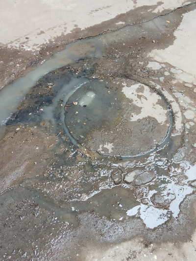 Overflowing manholes in Markham and Magrath cross