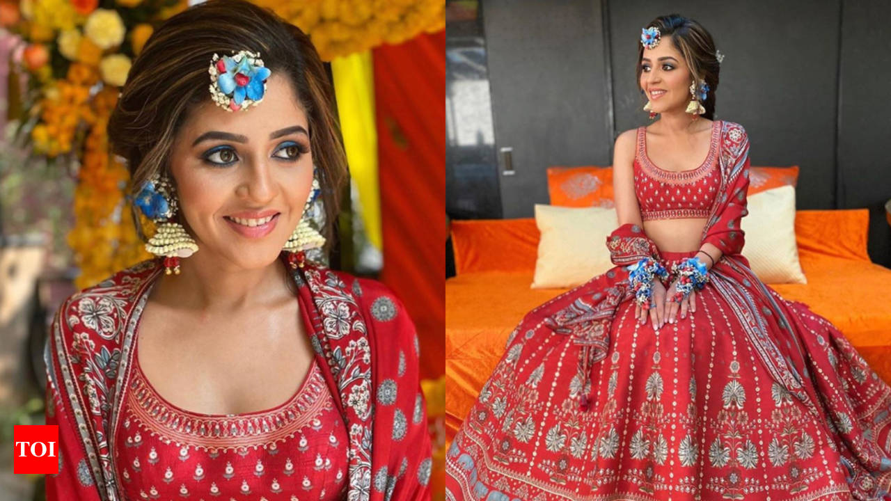 This bride wore a gorgeous red Anita Dongre lehenga for her Mehendi Times of India