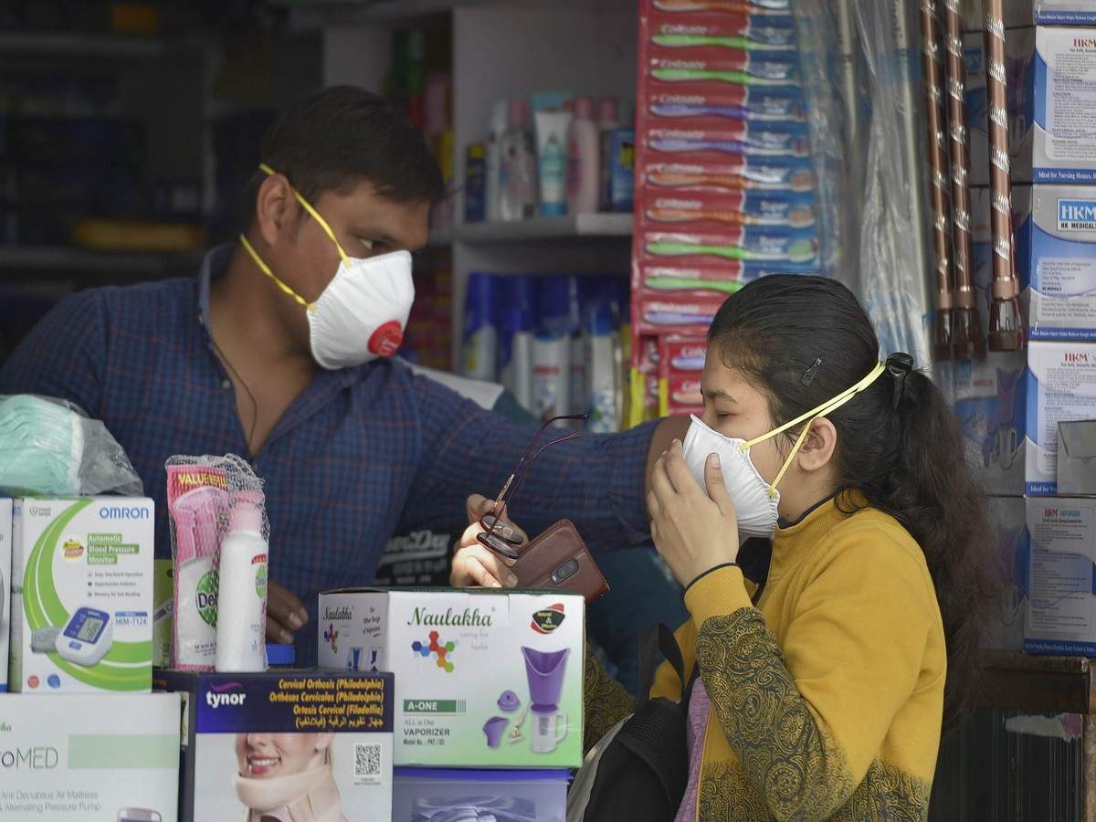 Masks & hand sanitizers declared essential commodities, govt can cap  storage quantity & fix price - Times of India
