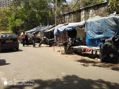 illegal shanties blocking the road