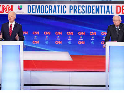 Distance and silence: Biden, Sanders clash without audience - Times of ...