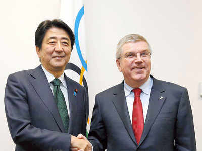 Japan PM, IOC chief to speak as Olympics hang in the balance