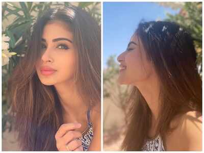 Mouni Roy hogs all the attention on internet as she looks gorgeous in this white and blue maxi dress!