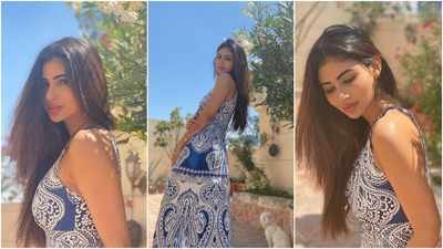 Mouni Roy hogs all the attention on internet as she looks gorgeous in this white and blue maxi dress!
