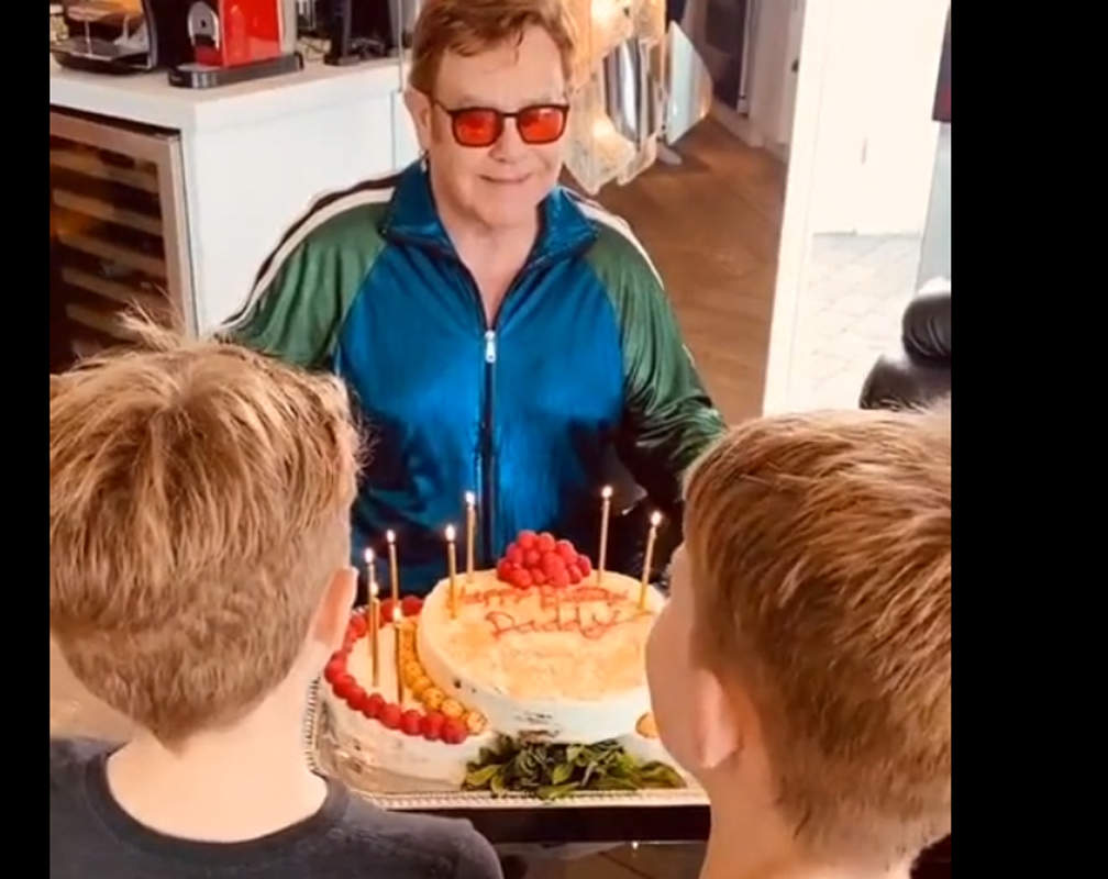 
Elton John's sons Zachary and Elijah sing to him on his birthday
