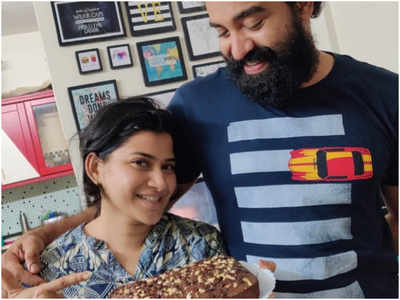 Siju Wilson receives a treat of homemade chocolate cake from wifey Shruthi Vijayan amid the self-quarantine period
