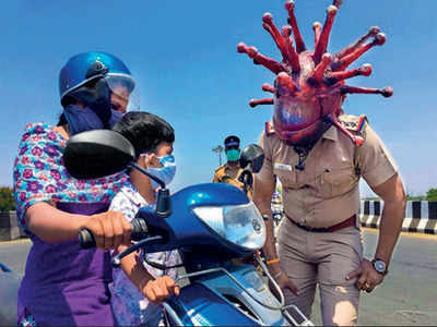 Chennai: Want me to come with you, cop with coronavirus mask asks motorists
