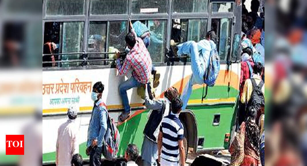 Uttar Pradesh blames Delhi govt for influx of migrant workers amid ...