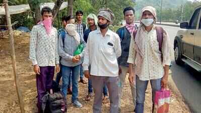 Stranded migrant workers take long walk back home | Visakhapatnam News ...