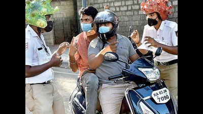 Bengaluru: ‘Corona helmets’ to drive home message