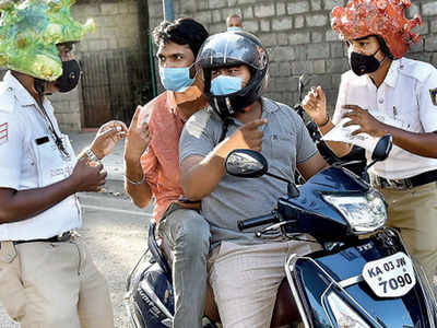 Bengaluru: ‘Corona helmets’ to drive home message