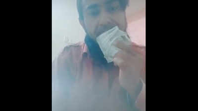 Maharashtra: Nashik rural police act against man wiping nose, mouth with currency notes