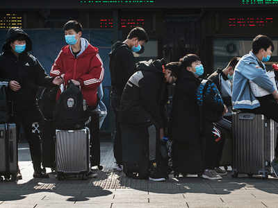 Chinese students fleeing virus face uneasy reception back home