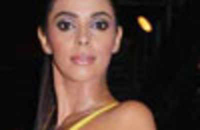 Mallika's twin item numbers for Rs 3 crore