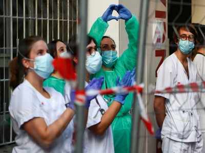 Spain’s virus toll rises by 674 but pace keeps slowing